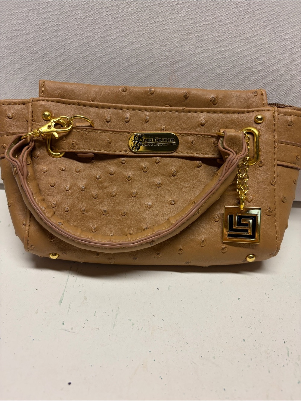 Beige Mini Wristlet with Gold Charm by